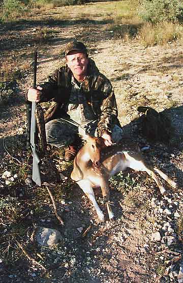 Don Netek with Axis Doe on hunting trip with Scott Hickman of Circle - H - Outfitters