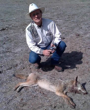 Don Netek hunting with friend Mike Corron and Alan Brown, with harvested coyete